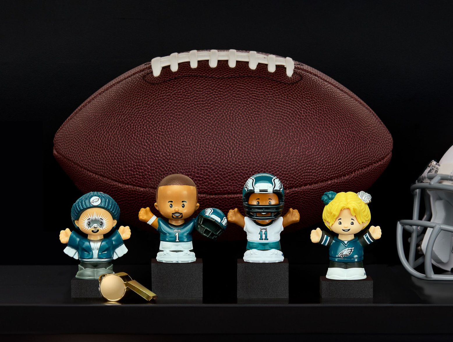 eagles little people collector set, feature a male eagles fan, Jalen hurts, aj brown, and a female eagles fan