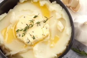 creamy mashed potatoes topped with a glob of melting butter