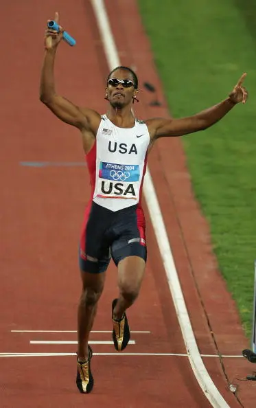Darold Williamson of USA competes in the men's 4 x 400 metre relay final on August 28, 2004 