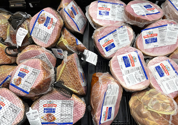 Smoked ham is displayed for sale in a grocery store ahead of the Easter holiday