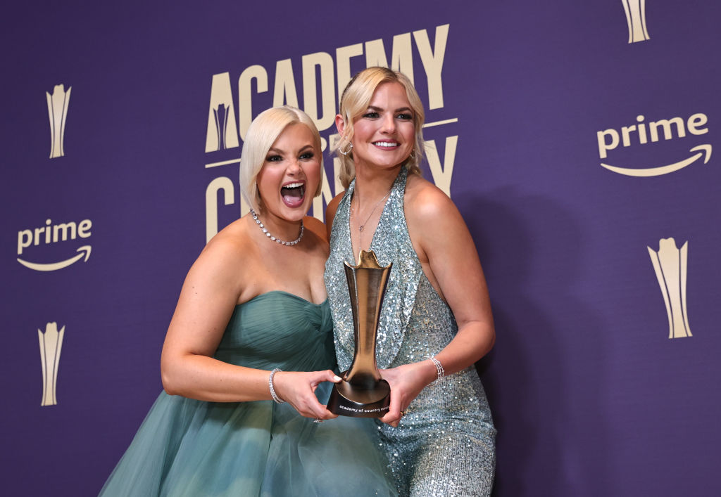 Kendra Slaubaugh and Krista Slaubaugh of Tigirlily Gold, winners of the New Duo/Group of the Year award, pose in the press room during the 59th Academy of Country Music Awards