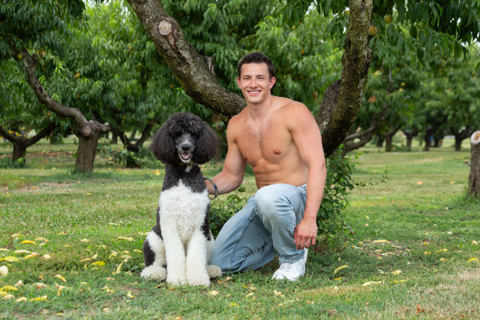 Andie Summers' dog Bob Ross poses with model Ethan for Philadoptables Hunks for Hounds calendar